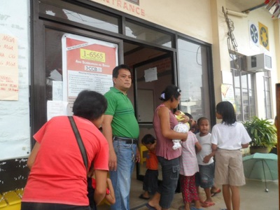 Archived moment from a community feeding, health, or family outreach activity