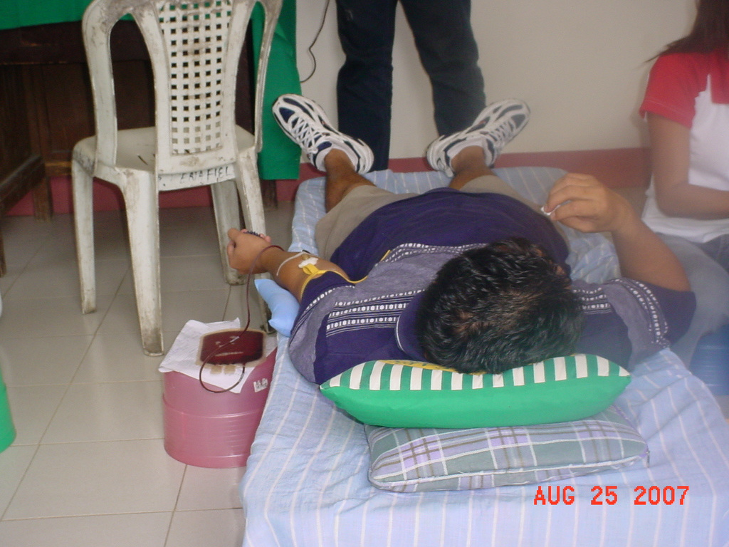 Archived moment from a community feeding, health, or family outreach activity
