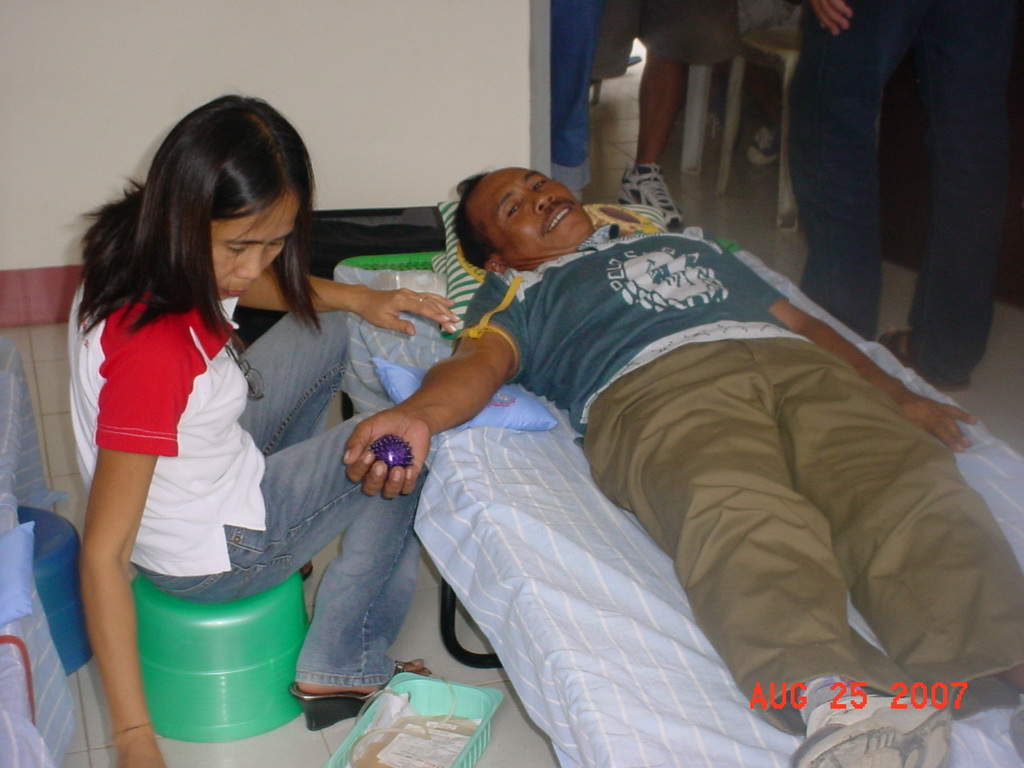 Archived moment from a community feeding, health, or family outreach activity