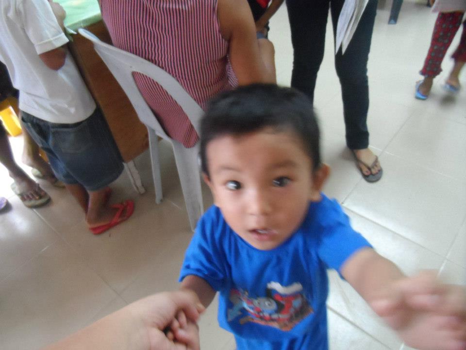 Archived moment from a community feeding, health, or family outreach activity