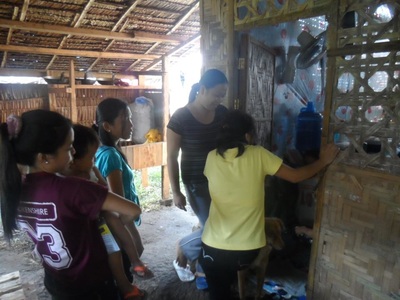 Archived moment from a community feeding, health, or family outreach activity