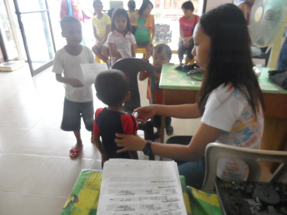 Archived moment from a community feeding, health, or family outreach activity