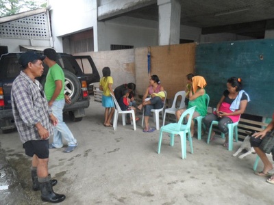 Archived moment from a community feeding, health, or family outreach activity