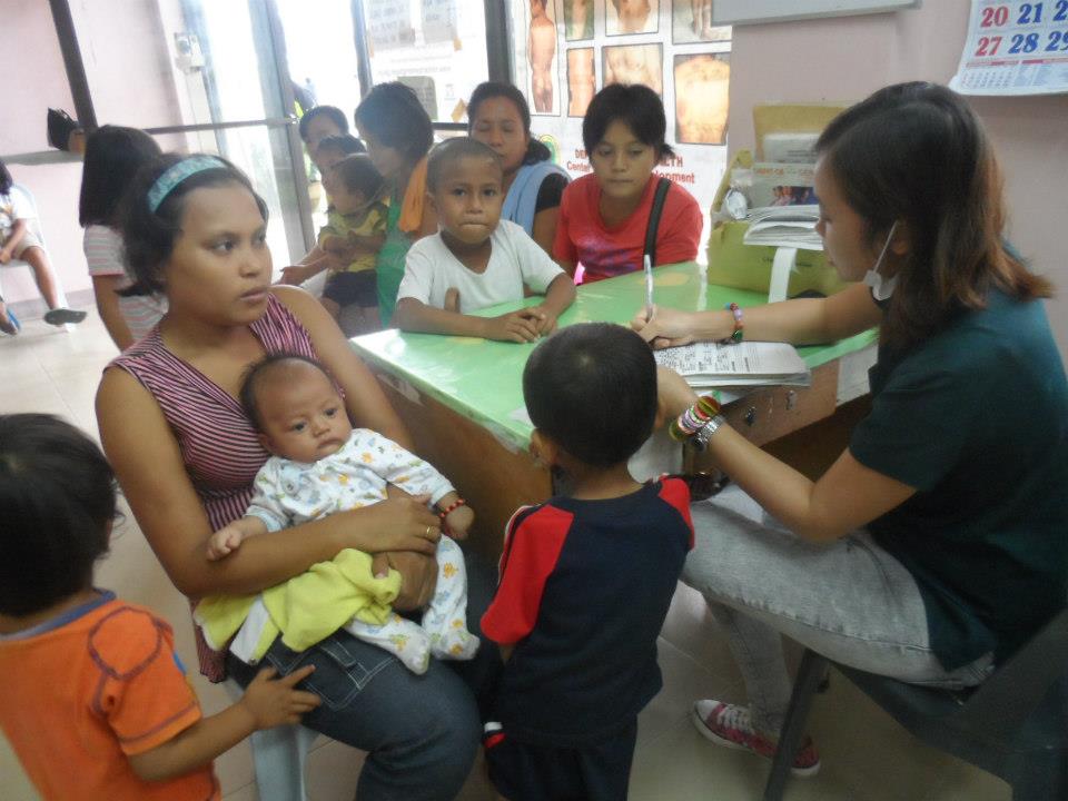 Archived moment from a community feeding, health, or family outreach activity