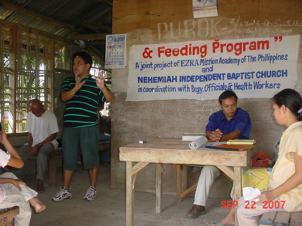 Archived moment from a community feeding, health, or family outreach activity
