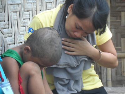 Archived moment from a community feeding, health, or family outreach activity