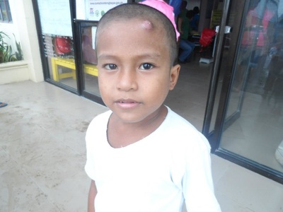 Archived moment from a community feeding, health, or family outreach activity