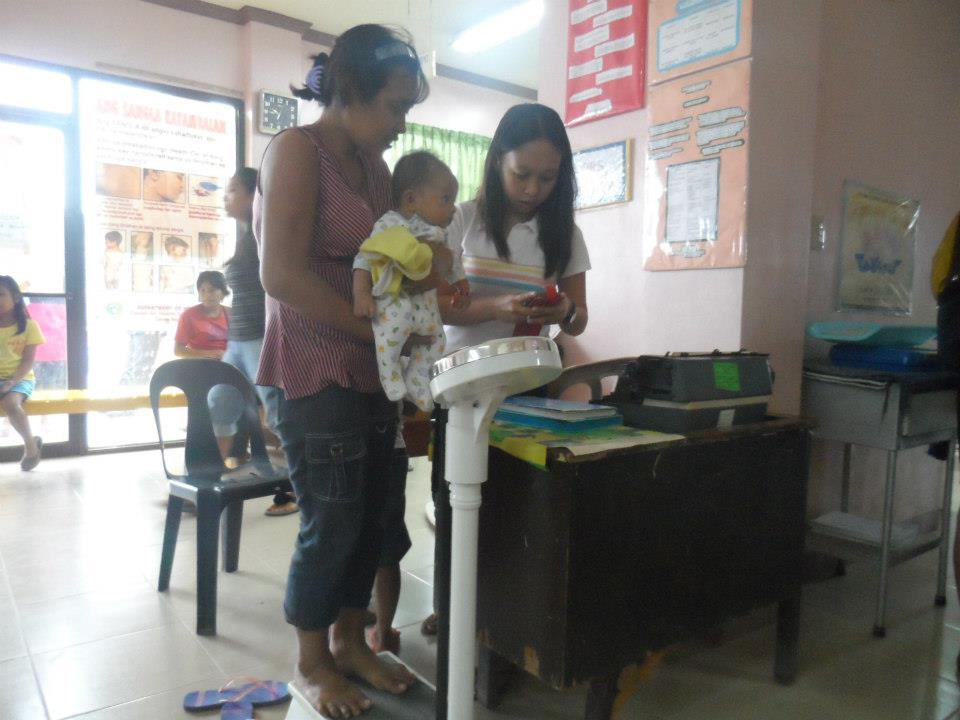 Archived moment from a community feeding, health, or family outreach activity
