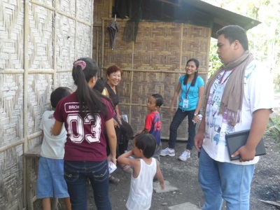 Archived moment from a community feeding, health, or family outreach activity