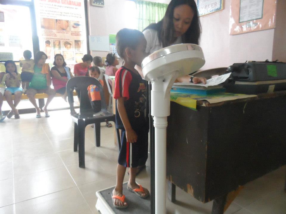 Archived moment from a community feeding, health, or family outreach activity