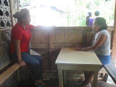 Archived moment from a community feeding, health, or family outreach activity