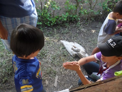 Archived moment from a community feeding, health, or family outreach activity