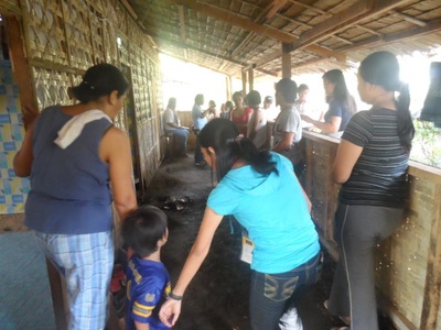 Archived moment from a community feeding, health, or family outreach activity