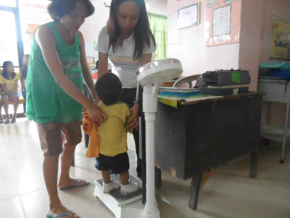 Archived moment from a community feeding, health, or family outreach activity