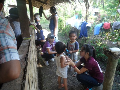 Archived moment from a community feeding, health, or family outreach activity
