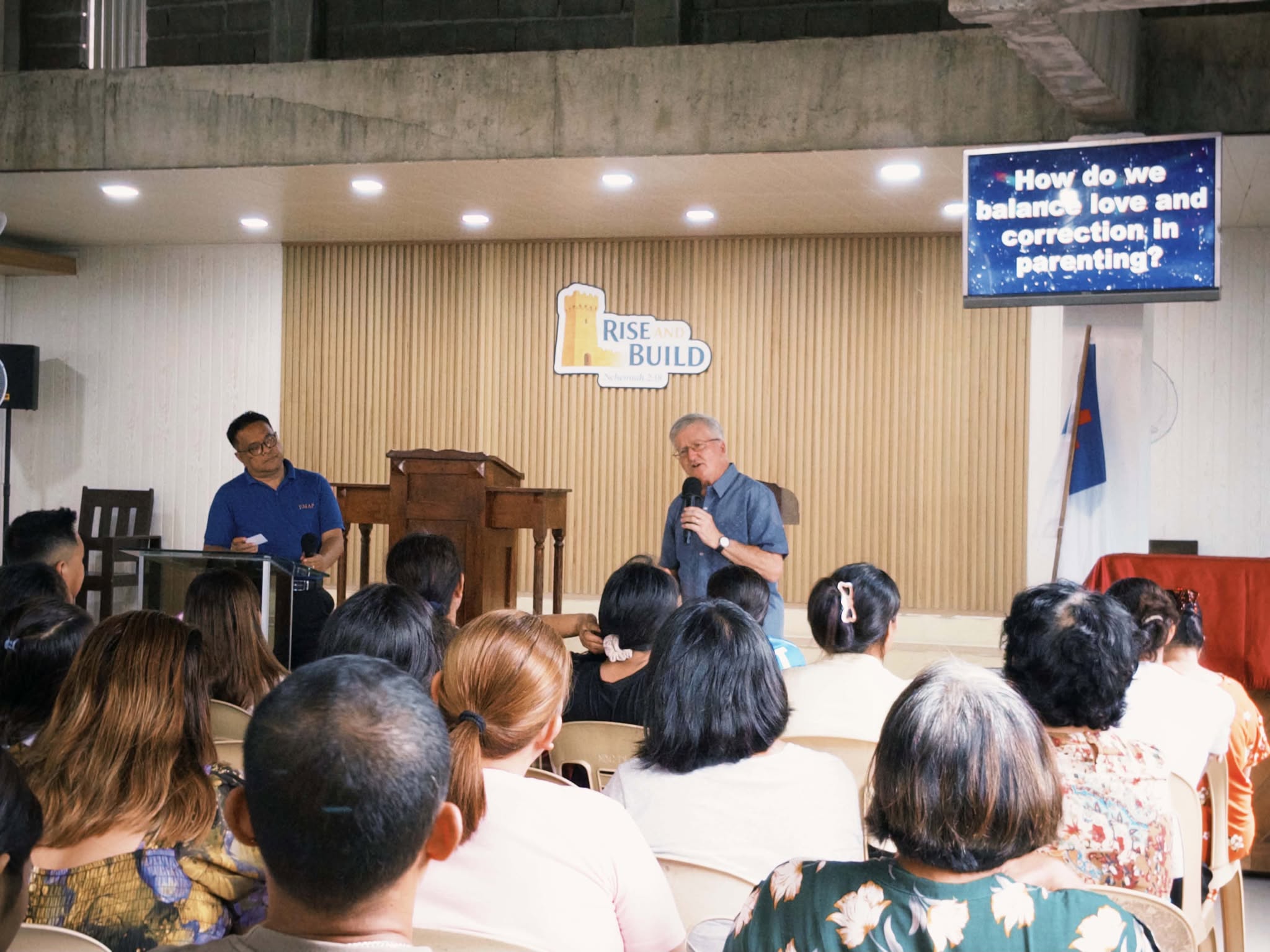 Evangelist Chovan teaching the congregation at Nehemiah Baptist Church