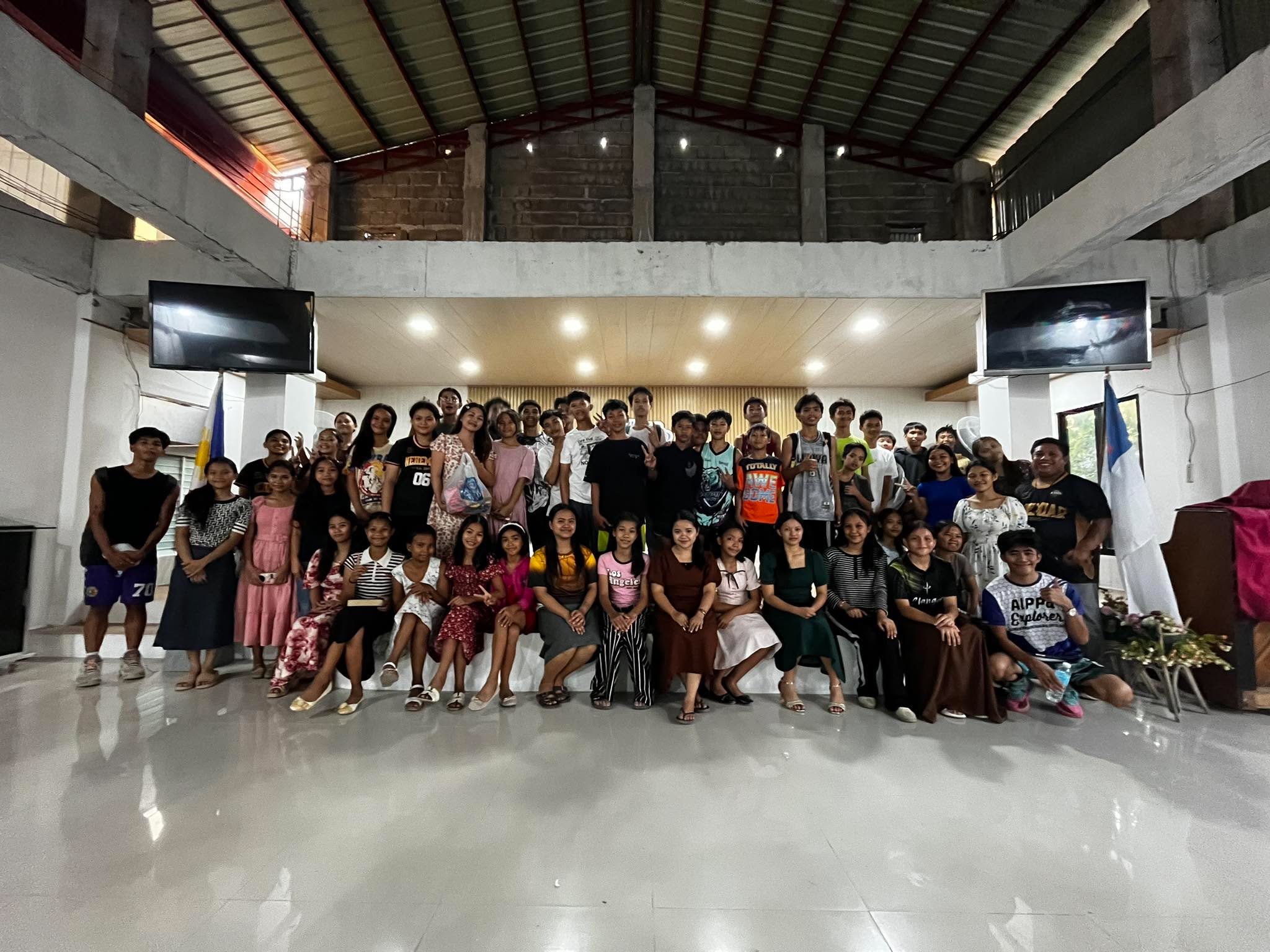 Young people gathered for a group photo at the 3rd Quarterly Youth Fellowship
